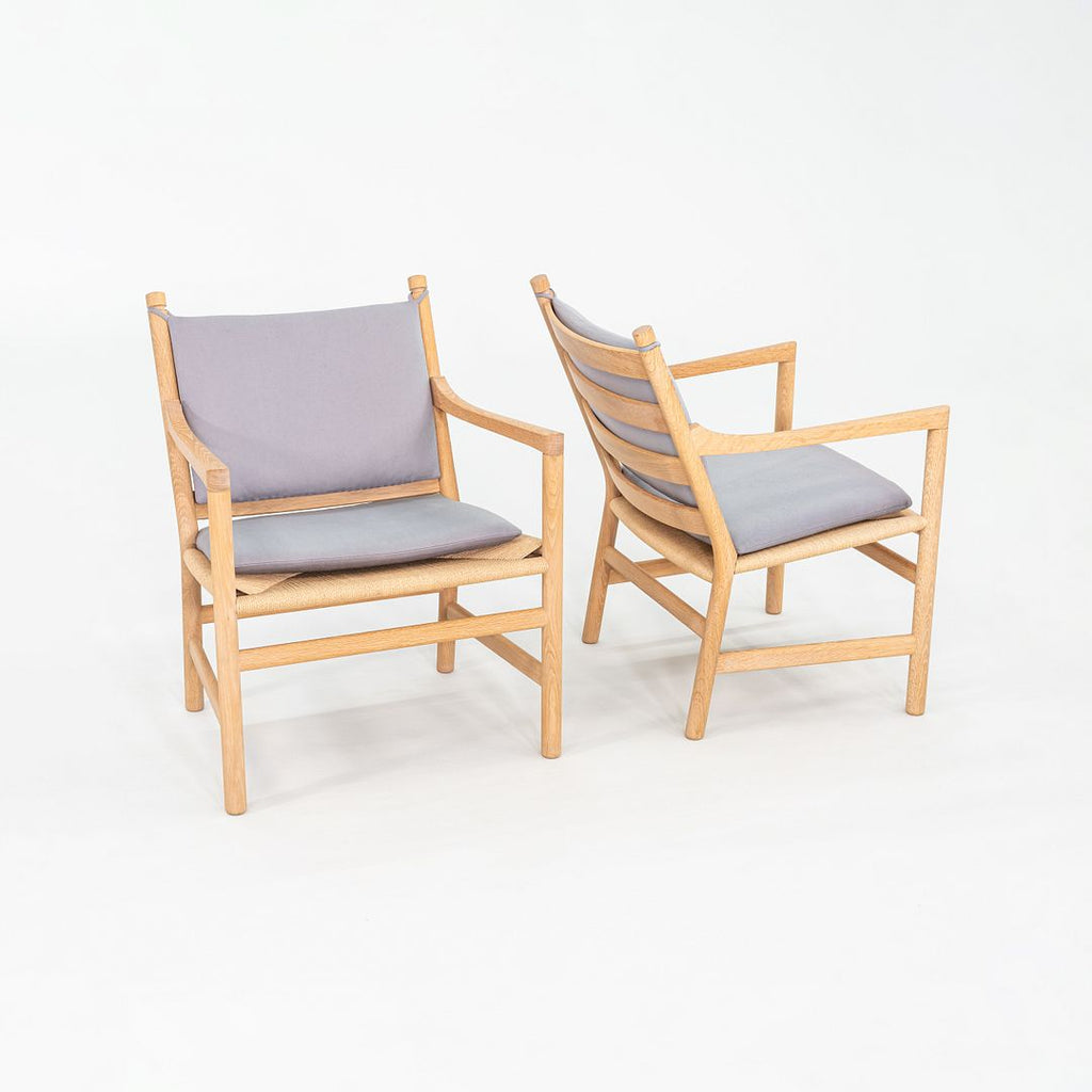 C. 2020 Pair of Hans Wegner for Carl Hansen CH44 Ladderback Lounge Chairs in Oak with Cushions