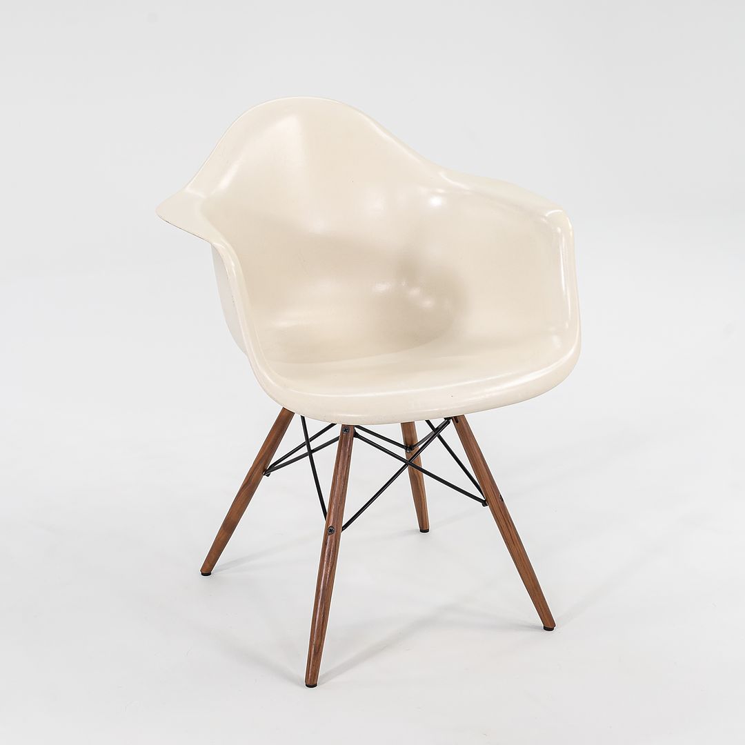 2016 DFAW Armchair by Charles and Ray Eames for Herman Miller in Parchment Fiberglass and Walnut 2x Available