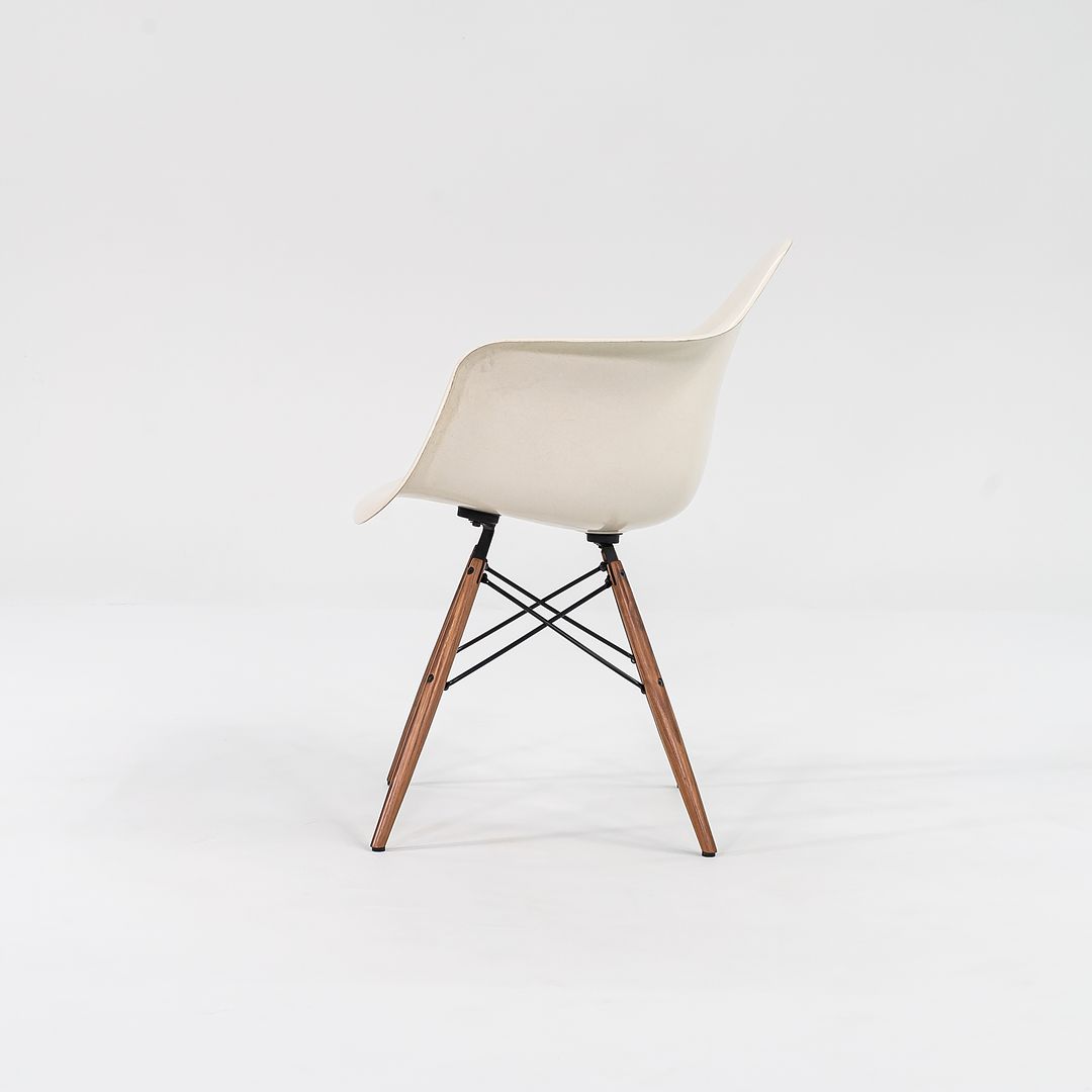 2016 DFAW Armchair by Charles and Ray Eames for Herman Miller in Parchment Fiberglass and Walnut 2x Available