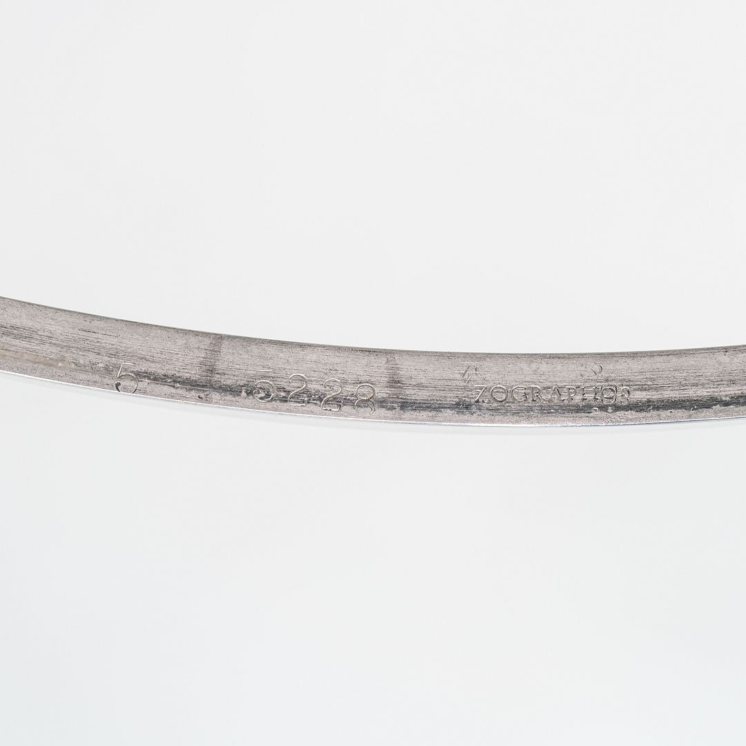 1990s Nicos Zographos Polished Stainless Steel and Glass Coffee Table TA.35.42G