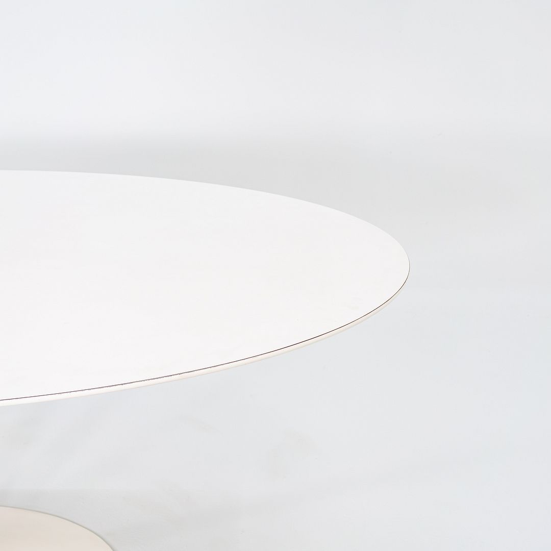 SOLD 1960s Eero Saarinen for Knoll 78x48 inch Oval Tulip Dining Table in White Laminate
