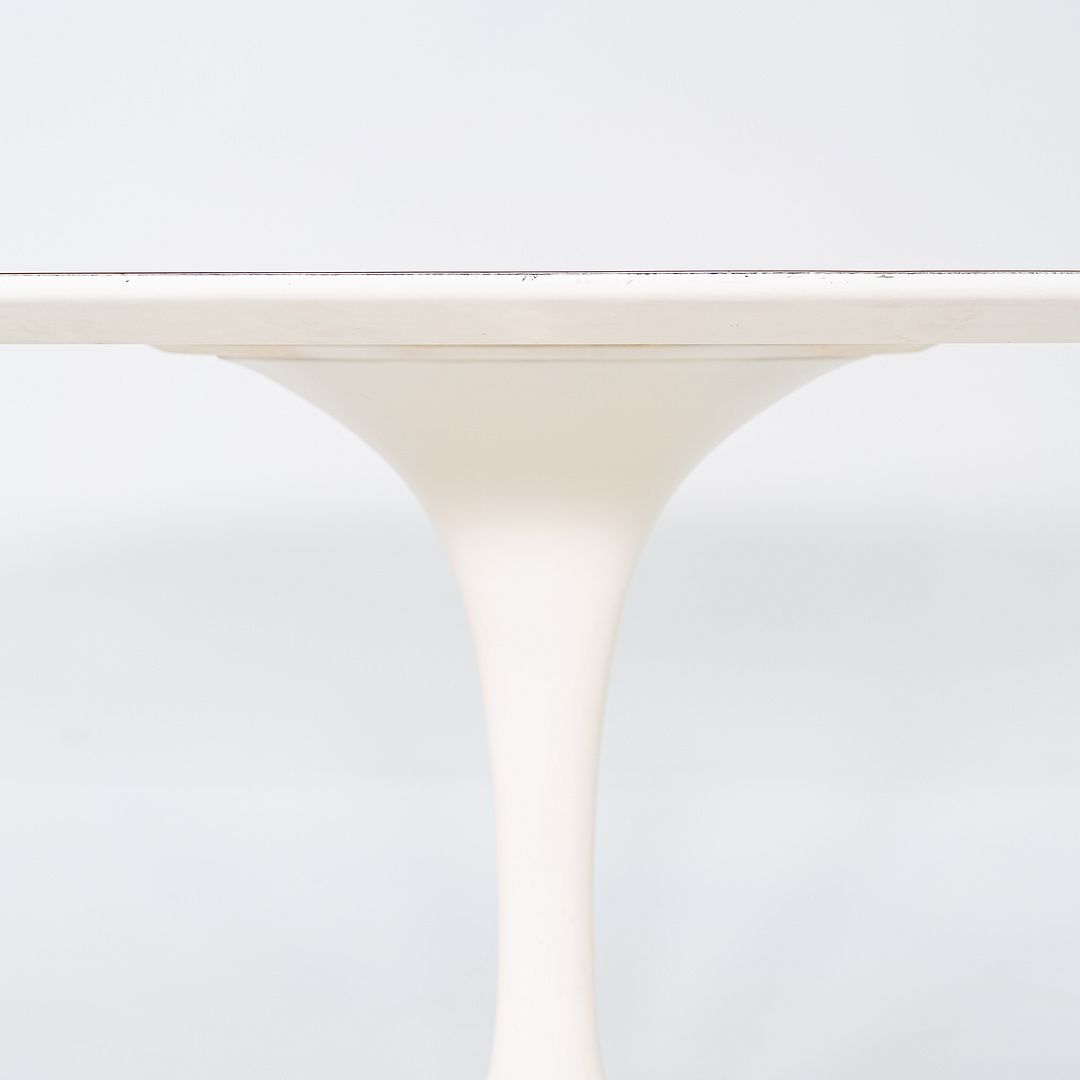 SOLD 1960s Eero Saarinen for Knoll 78x48 inch Oval Tulip Dining Table in White Laminate